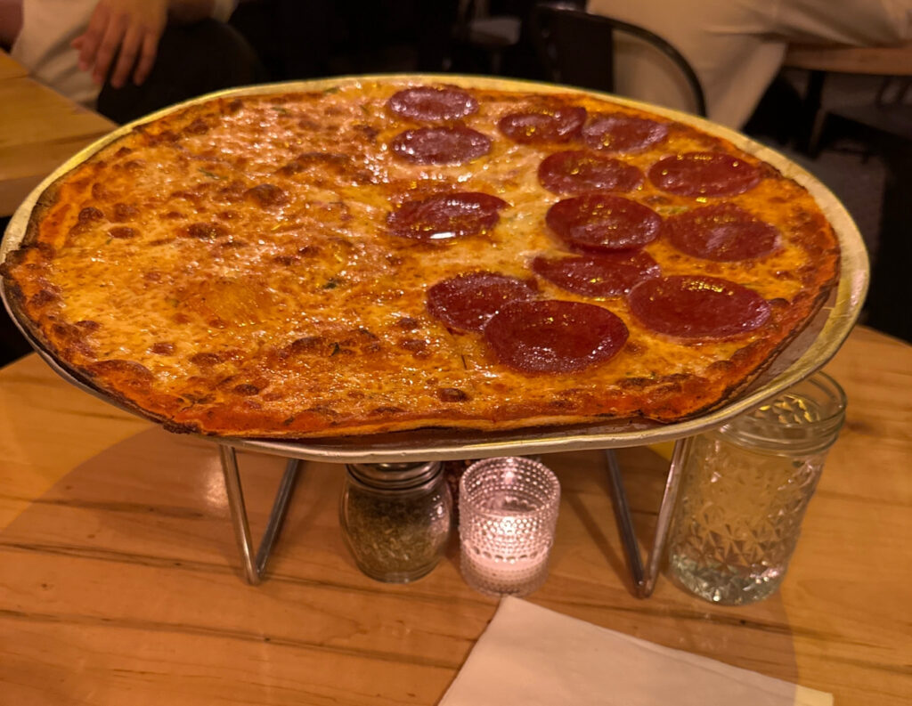 We love eating at Tappo Pizzeria in the Flatiron. Best thin crust pizza on earth.