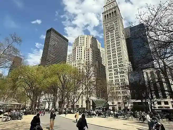 Madison Square Park in spring with the Metropolitan Life clock tower beyond the trees