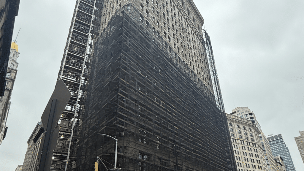 View of the Flatiron Building under construction near 159 Madison Avenue Co-Op.