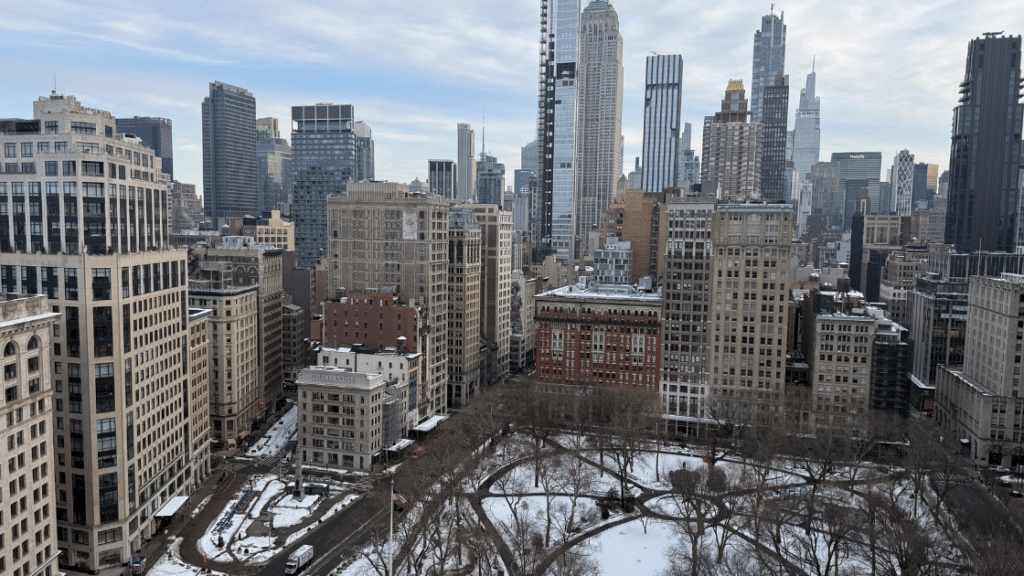 View of 262 Fifth Avenue Condominium in front of the Empire State Building from the Flatiron District.