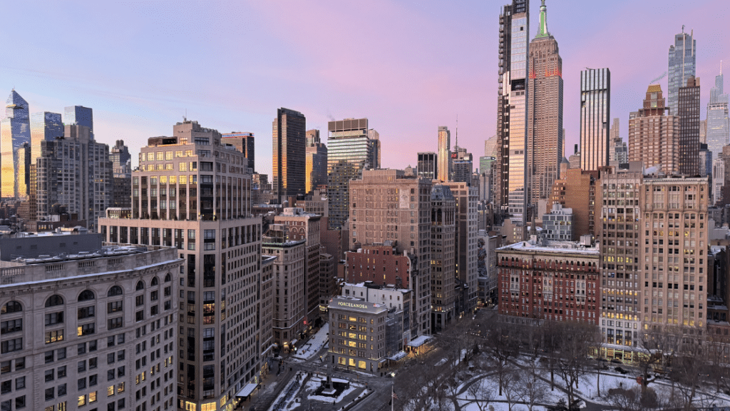 View at dusk of the Flatiron District, home to a great building in the 254 PAS Condominium.