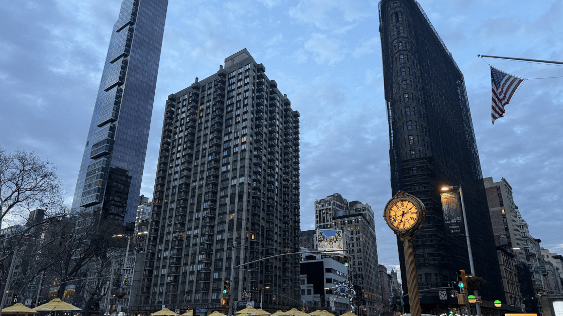View of the famous Flatiron District Clock where David Glasgow Farragut who's bronze statue lives near in Madison Square Park.